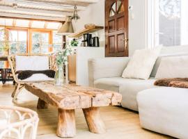 "Albatros" Knus huisje op Texel, casa de campo em De Koog