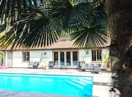 Rural Cottage Retreat, Near Goodwood Festival of Speed, Dog Friendly with Shared Outdoor Pool, gardens & Tennis, Free Parking! Chichester Holiday Properties