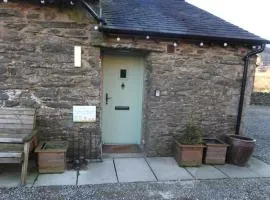 Oak Tree Cottage nestled in the hills of the Lake District and Yorkshire Dales