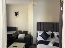 Sahel Executive Studio apartment with separate kitchen and bathroom in another section from the main room for cheap accommodation in Elgon View near Eldoret sports club,Rapha Hospital, Naivas supermarket, rupha mall, and Eldoret International Airport