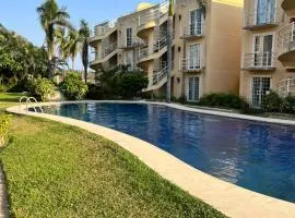 Depto en Planta Baja con Alberca, WiFi Rápido y Smart TV