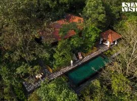 StayVista at The Forest Echoes with Pool, BBQ