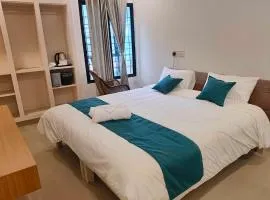 Hotel O JLN Stadium Ernakulam Formerly Peediyal Tower