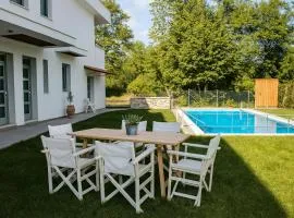 Aristotelia Gi Ikies - Olympiada Poolside Retreats