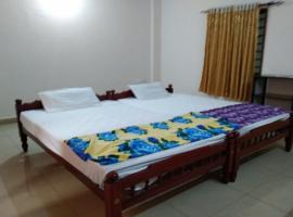 SPOT ON Sana Tourist Home, hotel v destinaci Kollam