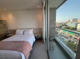 Hermosa y Comoda Suite en Distrito 90