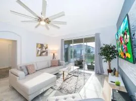 Disney-Themed Townhome in ChampionsGate Resort 15 min from Disney World with 7 Pools, Gym, Golf, Lazy River, Water Park, Arcades, Theatre, and More!
