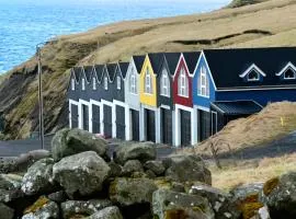 Eiðsvíkslon - The Red Boathouse by the Sea