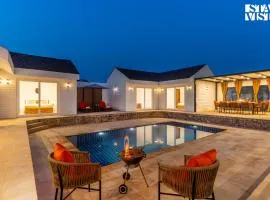 StayVista at The Leo's Manor with Bonfire, Pool