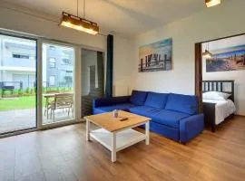 Bright Sun Seasons 24 Apartments in Pogorzelica Close to the Beach with Parking and Balcony by Noclegi Renters