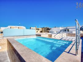 Rooftop Pool Sensations Apartments all with WIFI and AC by 360 Estates, hotel a Mellieħa