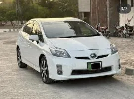 White car - TOYOTA PRIUS MODEL 2010