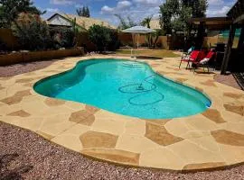 Cozy home with pool, fire table, BBQ, RV parking