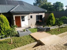 Warm Care Executive Apartments, hotel in Mpemba