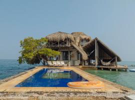 Isla Kalua - Private Ocean Villa, casa rústica em Isla Pavitos