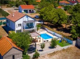 Family friendly house with a swimming pool Vrpolje, Sibenik - 24345