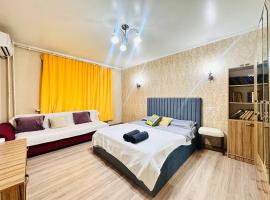 Уют для большой семьи в Золотом квадрате, hotel di Almaty