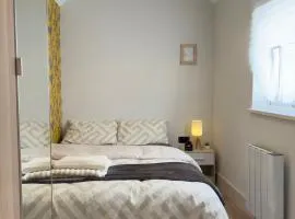 Chic Cozy Room with PS5, Mini Bar & Shared Spaces