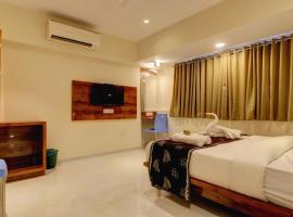 Hotel Sapphire Inn Residency, хотел в Тане
