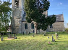 Tiny home in Grade 1 listed church garden