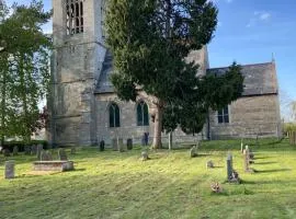 Tiny home in Grade 1 listed church garden