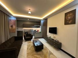 SpeedHome Apartment, hotel con estacionamiento en Kampala