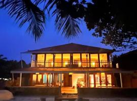 Twin Palms Villa and Homestay, ubytování s možností vlastního stravování v destinaci Tua Pejat