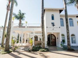 The Palms Boutique Hotel, hotel with parking in Hilton