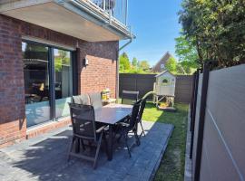 Traumhafte FeWo mit Garten und Sauna an der Küste、ドルヌムのホテル