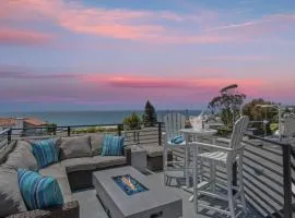 Penthouse Steps from Victoria Beach 180 degree ocean views