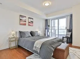 Cozy 1BR Condo with Balcony and Parking