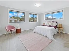 Center of Rouse Hill house with fully fenced back yard