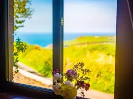 Polrunny Farm Elderberry Cottage with sea view