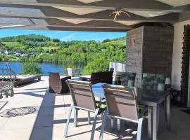 Seeblick-Ferienwohnung im "Ferienhaus Agger-Blick" mit traumhafter Sonnen-Terrasse, Sauna, E-Kamin & Kajak