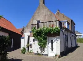The cosy little house with the sundial