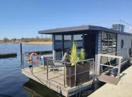 Hausboot Fjord Serina mit Biosauna in Schleswig