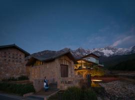 Lijiang Snow Mountain stone house, hotel v destinaci Li-ťiang