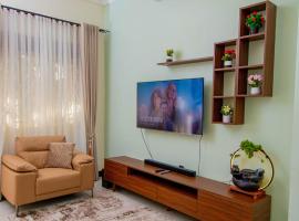 Urban Oasis located at Kyebando Nsooba, hotel con estacionamiento en Kyebando