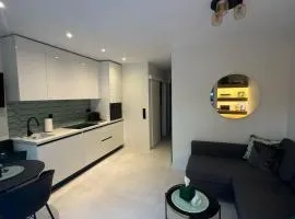 Cosy apartment with shared pool and garden