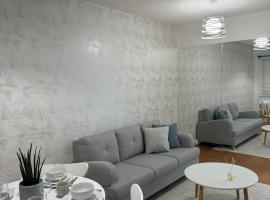 Modern Minimalist Luxe Retreat 2 Bedroom with parking, hotel em Manila