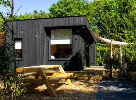 Knus gezinsverblijf in Cosi Tiny House op de Veluwe