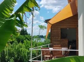 Maison bord rivière avec vue