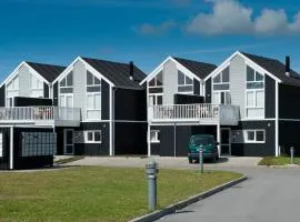 8 person holiday home on a holiday park in Løkken