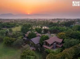 Nivaant Farms & Cottages - Nestled in lush greenery, offering a Swimming pool, Orchard, Jacuzzi & A spacious lawn with gazebo