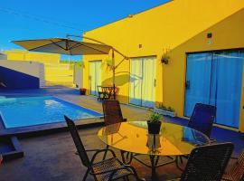 Pousada Família Alegria Hospedaria, hotel in Olímpia