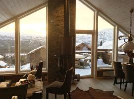 Ski-in ski-out high standard cabin, 3 bedroom, hotelli kohteessa Oppdal
