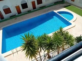 Studio with pool and sunrise view at 10 min beach walk