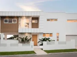 The Bay Haven - with Heated Pool and walk to beach