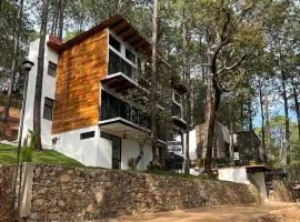 Hermosa cabaña en el bosque