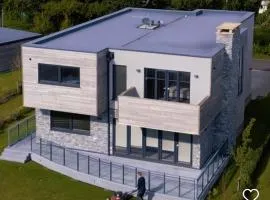 Modern 5 Bedroom Luxury Home with Sea Views and Hot Tub